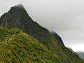 Ominous cloudy sky over tropical mountains between Mafate and Salazie circus, Reunion, France Royalty Free Stock Photo