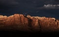 Ominous Dark Clouds Over the Last Light on Cliffs in Capitol Reef