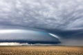 Ominous supercell storm clouds over a field Royalty Free Stock Photo