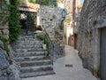 Omis, Croatia - July 23, 2021: Narrow street in the old town of Omis leading to the Mirabela fortress. Croatian historic street