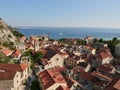 Omis, Croatia - July 23, 2021: Panorama of the old town of Omis with the historic Church of St. Michael in the center.