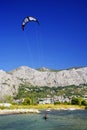 OMIS, CROATIA, SEPTEMBER 18, 2020 - Tourists enjoying kitesurfing during a windy sunny day in Omis Resort, Croatia. Royalty Free Stock Photo