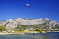 OMIS, CROATIA, SEPTEMBER 18, 2020 - Tourists enjoying kitesurfing during a windy sunny day in Omis Resort, Croatia. Royalty Free Stock Photo