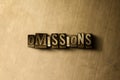 OMISSIONS - close-up of grungy vintage typeset word on metal backdrop Royalty Free Stock Photo