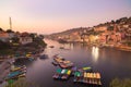 Omkareshwar cityscape, India, sacred hindu temple. Holy Narmada River, boats floating. Travel destination for tourists and pilgrim