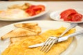 Omlette with toast bread and tomatoes Royalty Free Stock Photo