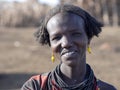 OMO RIVER, ETHIOPIA, MAY 11TH. 2019, Portrait of girl of Dassanech tribe, May 11Th. 2018 dating in Omo river, Ethiopia