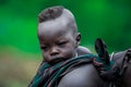 Omo River Valley, Ethiopia, November 2020, Portrait of a baby from the Mursi tribe