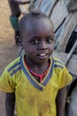 Close up portraits of Dassanech Tribe Children with Traditional Bright Necklace in the Local Village