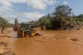 OMO VALLEY, ETHIOPIA - FEBRUARY 4, 2020: Bulldozer leveling a ford crossing of Kizo river, Ethiop