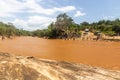 OMO VALLEY, ETHIOPIA - FEBRUARY 4, 2020: People waiting at the ford of Kizo river, Ethiop