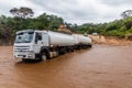 OMO VALLEY, ETHIOPIA - FEBRUARY 4, 2020: Truck stuck in swollen waters of Kizo river, Ethiop