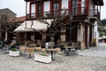 Omodos, Limassol District, Cyprus - Terraces and restaurants at the village market square