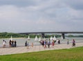 Omsk, Russia - August 04, 2013:Irtysh river embankment with people,view of Leningrad bridge