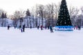 Omsk, russia, 2 January 2022.Winter ice rink. The people in the skate riding on the ice. Active family sport during the Royalty Free Stock Photo