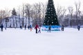 Omsk, russia, 2 January 2022.Winter ice rink. The people in the skate riding on the ice. Active family sport during the Royalty Free Stock Photo