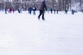 Omsk, russia, 2 January 2022.Winter ice rink. The people in the skate riding on the ice. Active family sport during the Royalty Free Stock Photo