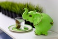 OMSK, RUSSIA, MAY 08, 2020: A small statuette in the form of an elephant of green color.