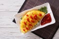 Omurice omelet stuffed with rice. horizontal top view