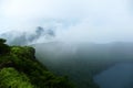Onami Ike emerging from the fog, Ebino kogen, Kyushu, Japan Royalty Free Stock Photo