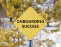Onboarding success symbol. Concept words Onboarding success on beautiful yellow road sign. Beautiful forest snow blue sky Royalty Free Stock Photo