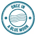 ONCE IN A BLUE MOON text on blue round postal stamp sign Royalty Free Stock Photo