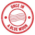 ONCE IN A BLUE MOON text on red round postal stamp sign Royalty Free Stock Photo