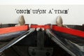 Once upon a time the text is typed on a vintage typewriter with black ink on the old paper Royalty Free Stock Photo