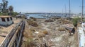 A oncebustling marina now surrounded by dry docks and abandoned boats due to a lack of water