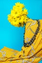 ÃÂ¡oncept of a gift for a business woman with trendy chain print: female business accessories yellow skirt and flowers on blue