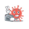 Oncovirus mascot design as a professional photographer working with camera Royalty Free Stock Photo
