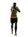 One african man referee running whistling silhouette Royalty Free Stock Photo