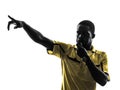 One african man referee whistling pointing silhouette Royalty Free Stock Photo
