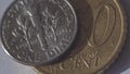 One American Dime on top of 50 Euro Cent B Royalty Free Stock Photo