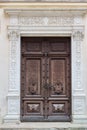 One of the ancient door with woodcarving at medieval Peles Castle, Romania