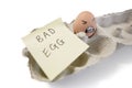 One bad egg with a face drawn on it Royalty Free Stock Photo