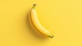 One banana single isolated on yellow background. Top view, copy space. Mockup banana fruit flat lay. Banner. Fresh tasty fruit Royalty Free Stock Photo