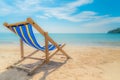 One beach chairs on the white sand with blue sky and summer sea background. Summer, Vacation, Travel and Holiday concept Royalty Free Stock Photo