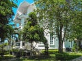 One beautiful three-story house with palm trees