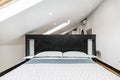 One-bedroom vacation rental apartment with black wooden headboard