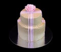 One beige cake with a pink rose Royalty Free Stock Photo
