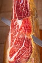 Slicing Spanish jamon iberico