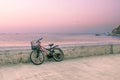 Lonely bicycle standing on concrete pier. Royalty Free Stock Photo