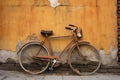 one bicycle parked against a rustic wall Royalty Free Stock Photo