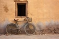 one bicycle parked against a rustic wall Royalty Free Stock Photo