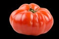 One big beef tomato on black background Royalty Free Stock Photo