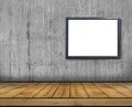 One big blank billboard attached to a concrete wall inside with wooden floor Royalty Free Stock Photo