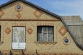 One big brown brick loft of a rural house with a window and a door Royalty Free Stock Photo