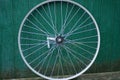 One big gray metal bicycle wheel Royalty Free Stock Photo