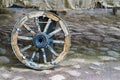 One big old wheel for the animal-drawn vehicle or for the cart